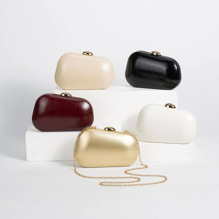 QUINN SIGNATURE LEATHER CLUTH